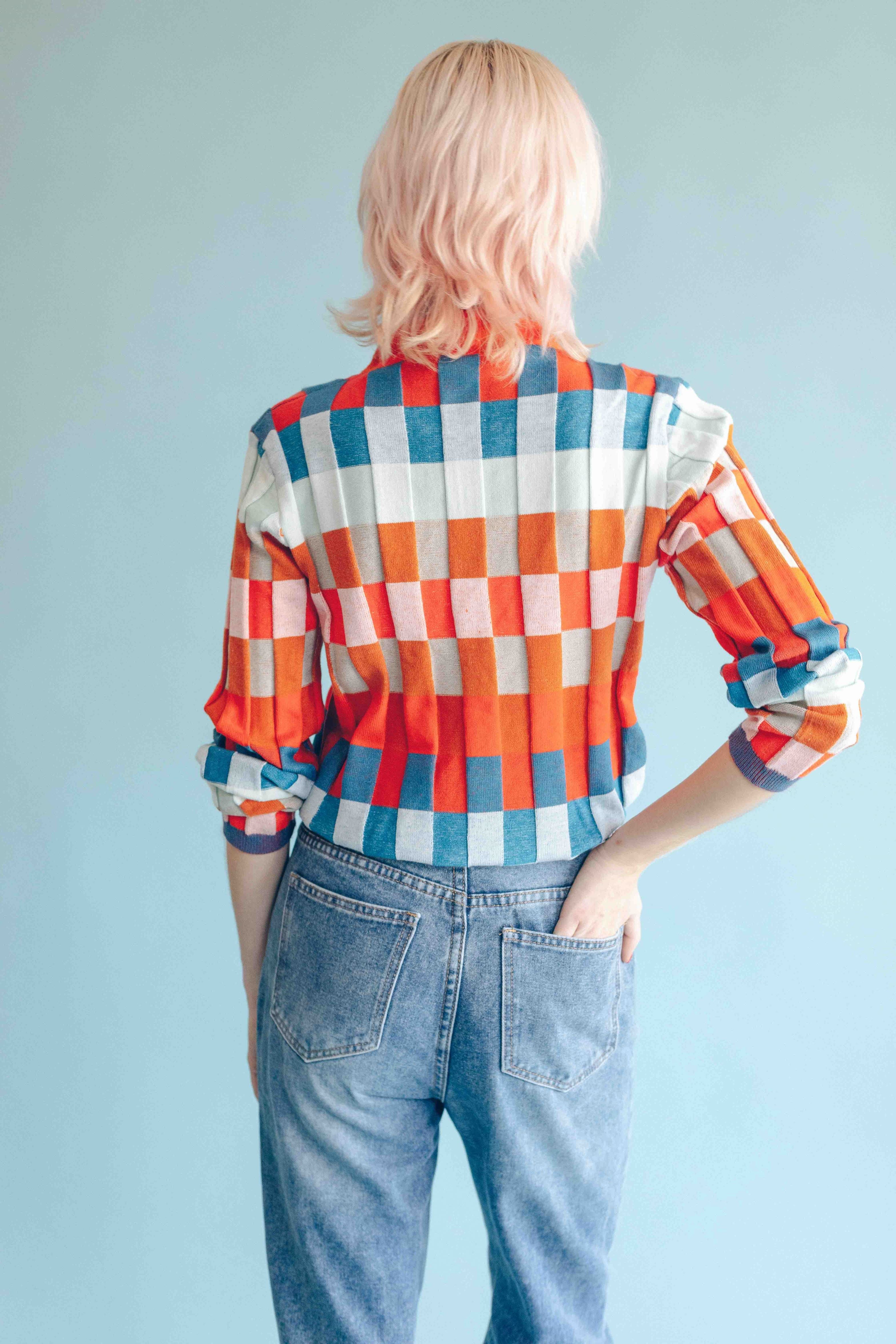 CHECKERBOARD TURTLENECK PULLOVER