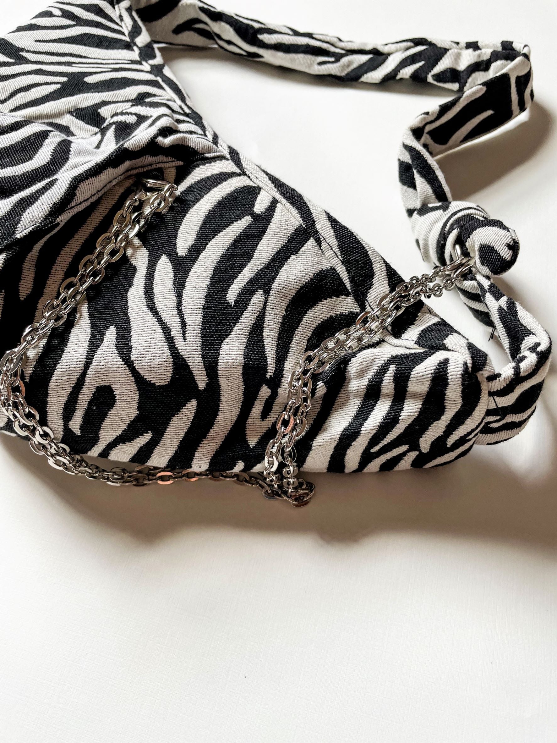 PRINTED CANVAS KNOT BAG WITH CHAIN