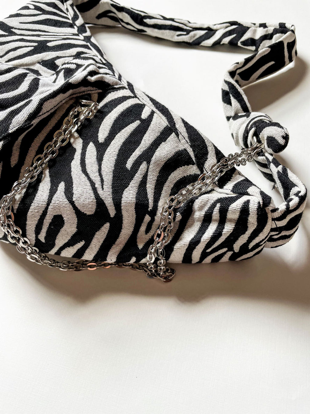 PRINTED CANVAS KNOT BAG WITH CHAIN