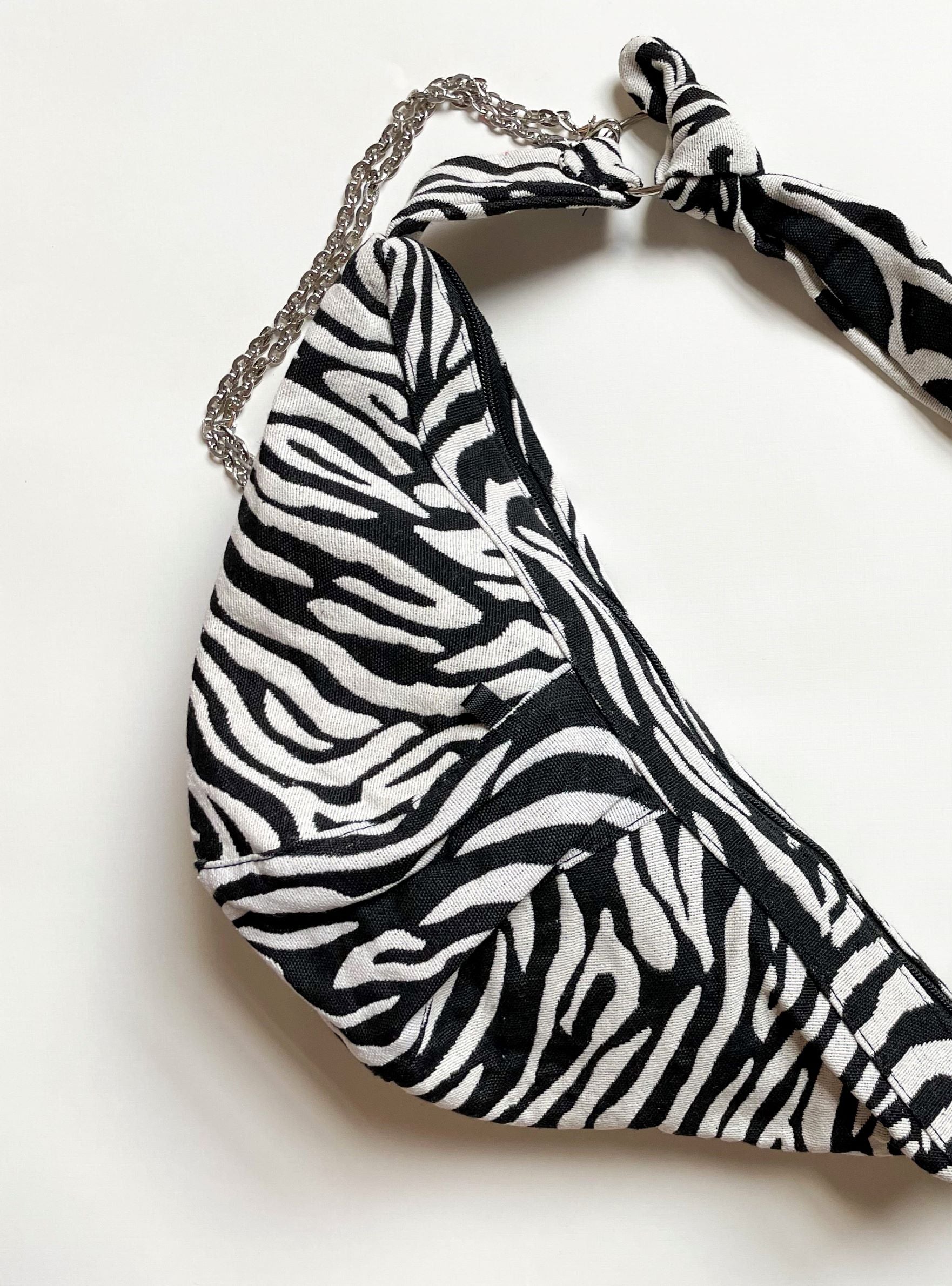 PRINTED CANVAS KNOT BAG WITH CHAIN