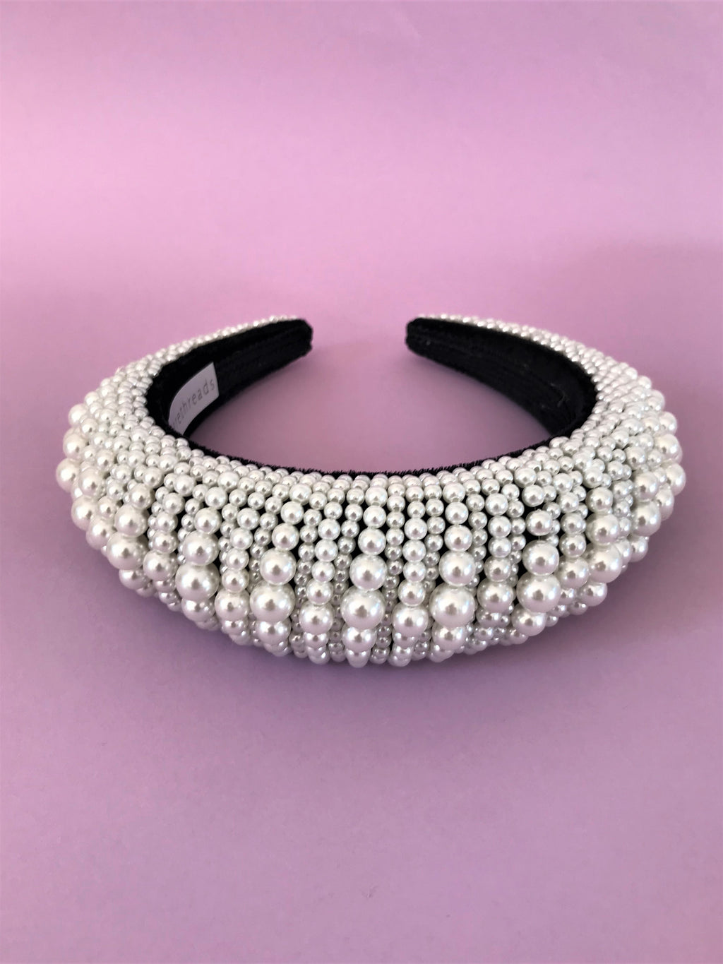 THE ASTERIA PADDED PEARL BAND